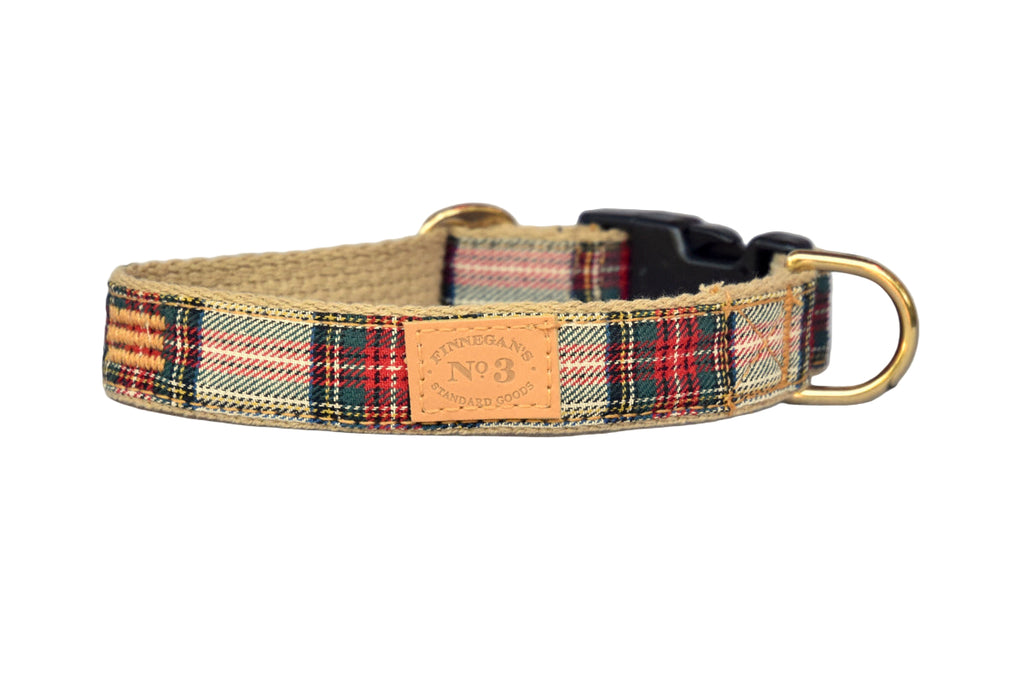 Plaid dog collar with leather patch on a gray background